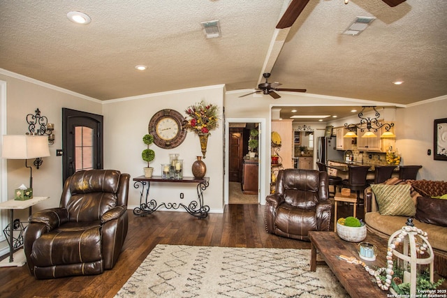 living room with ceiling fan, crown molding, dark wood-type flooring, and a textured ceiling