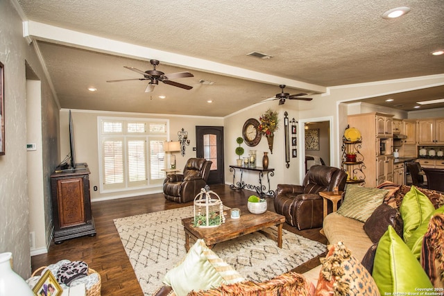 living room featuring crown molding, a textured ceiling, dark hardwood / wood-style floors, ceiling fan, and beam ceiling