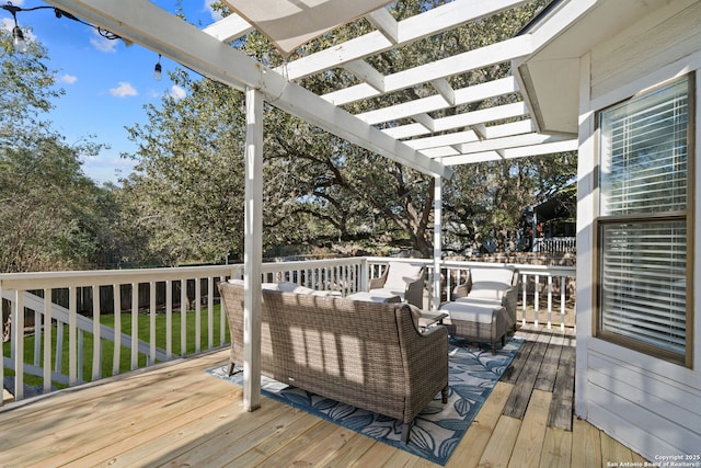 wooden deck featuring a pergola and outdoor lounge area