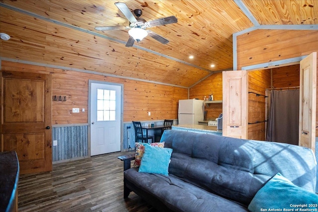 living room with wood walls, wood ceiling, vaulted ceiling, dark hardwood / wood-style floors, and ceiling fan