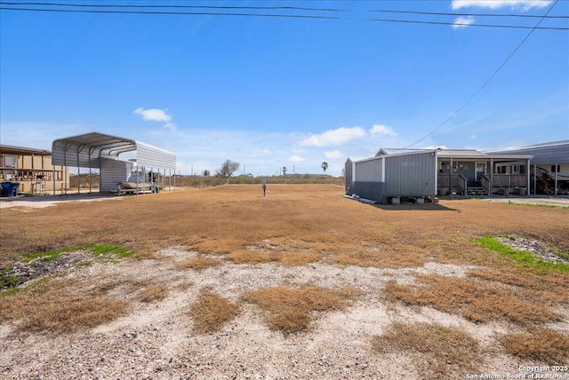 view of yard featuring a carport