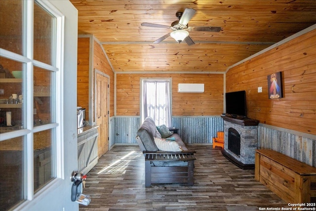 unfurnished living room with dark wood-type flooring, a stone fireplace, vaulted ceiling, and wooden ceiling