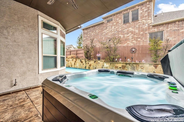 view of patio featuring a hot tub