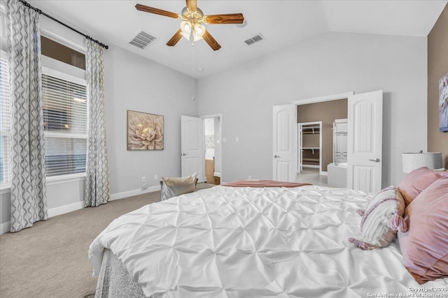 carpeted bedroom featuring ceiling fan and high vaulted ceiling