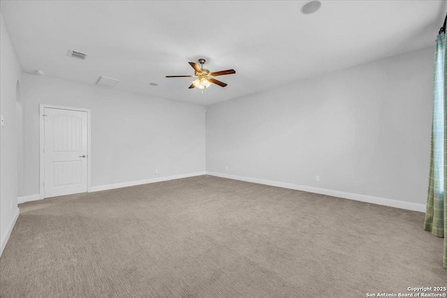 carpeted empty room with ceiling fan