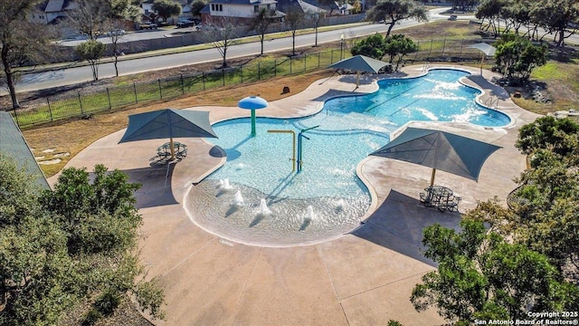 view of swimming pool featuring a patio