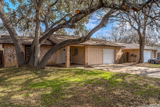 ranch-style home with a garage and a front lawn