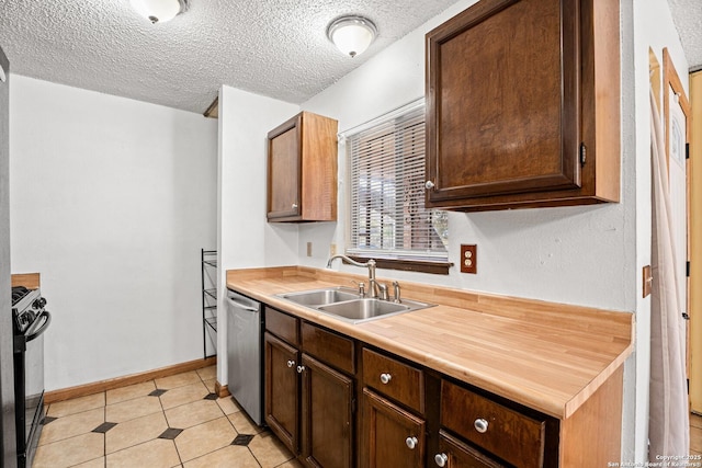 kitchen featuring sink, a textured ceiling, light tile patterned flooring, black range with gas stovetop, and stainless steel dishwasher