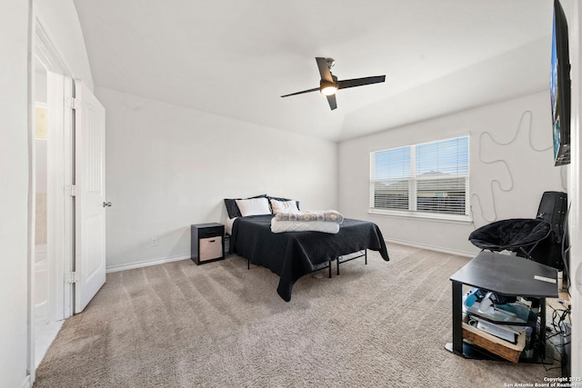 bedroom with light colored carpet and ceiling fan