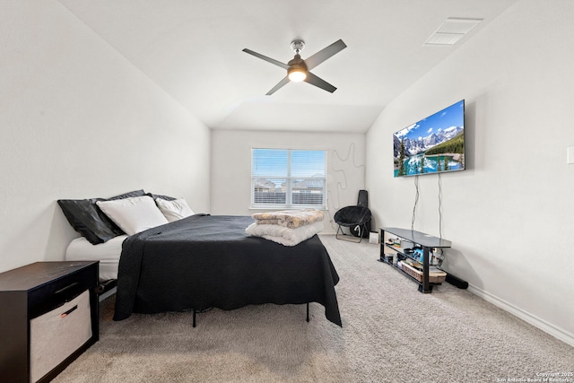 carpeted bedroom with ceiling fan and lofted ceiling