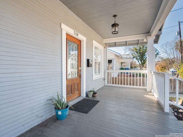 wooden deck with a porch