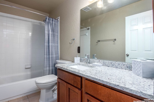 full bathroom featuring vanity, shower / bath combo, tile patterned floors, and toilet