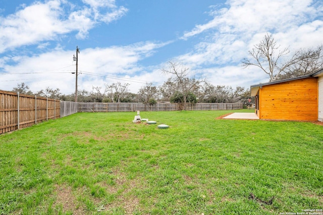 view of yard with a patio area