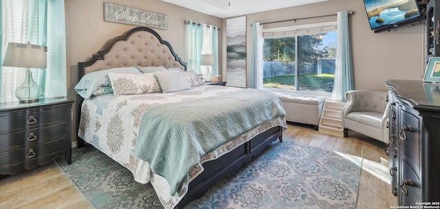 bedroom with light wood-type flooring