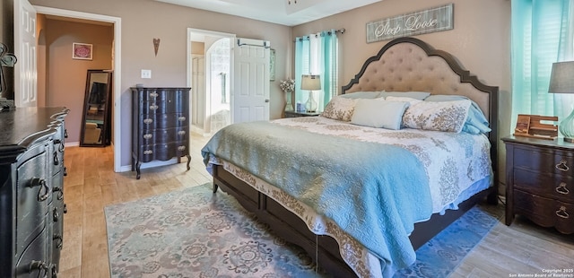 bedroom featuring light wood-type flooring