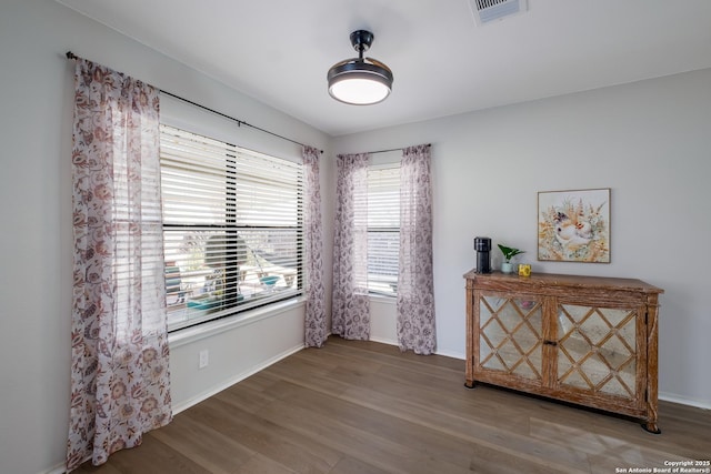 empty room featuring hardwood / wood-style flooring