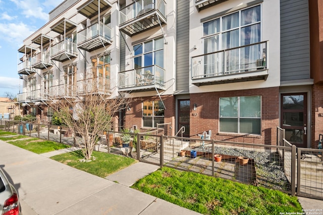 view of property featuring a fenced front yard