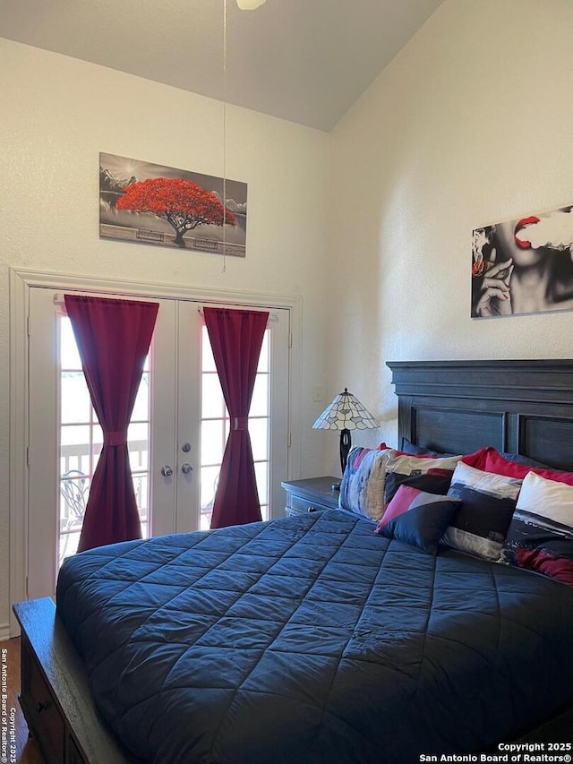 bedroom featuring multiple windows and french doors