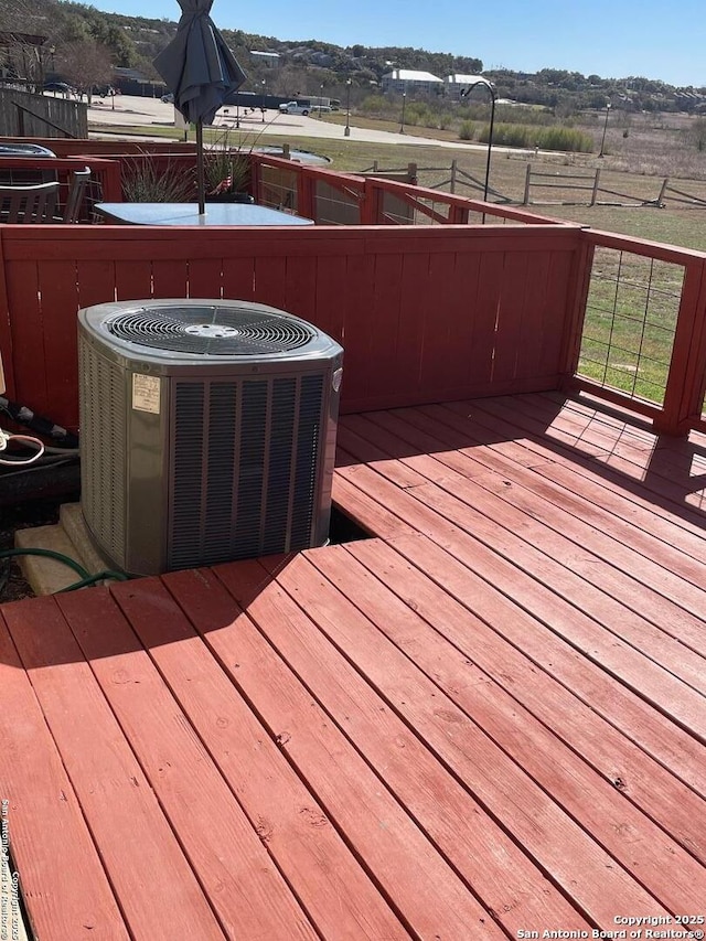 deck with central air condition unit