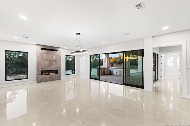 unfurnished living room with a fireplace