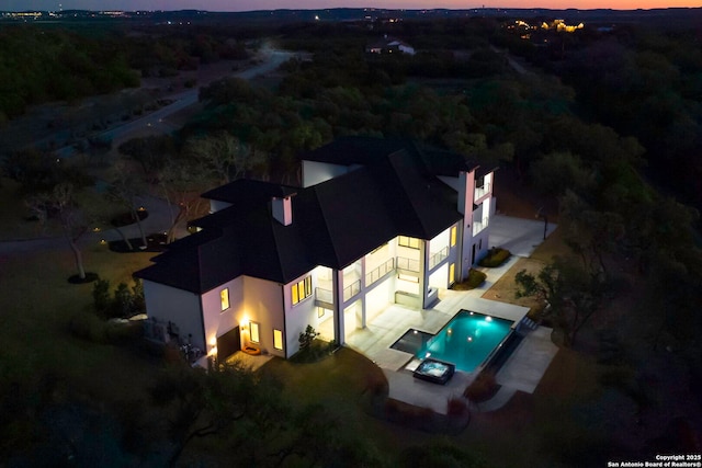 view of aerial view at dusk