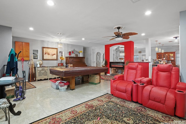 game room featuring ceiling fan and light tile patterned floors