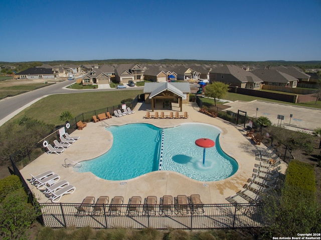 view of swimming pool with a patio area