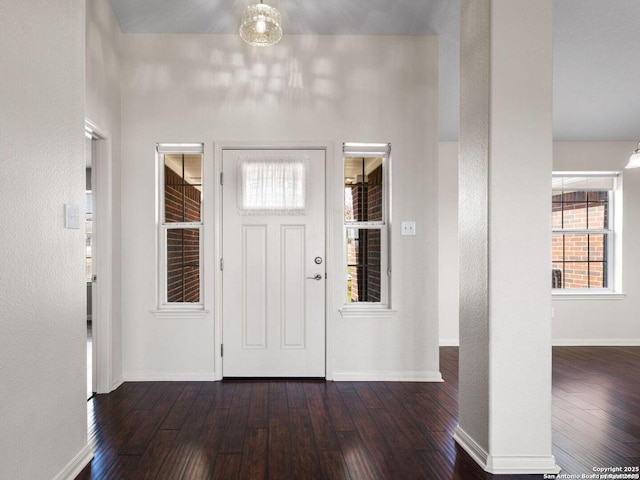 entrance foyer with dark hardwood / wood-style flooring