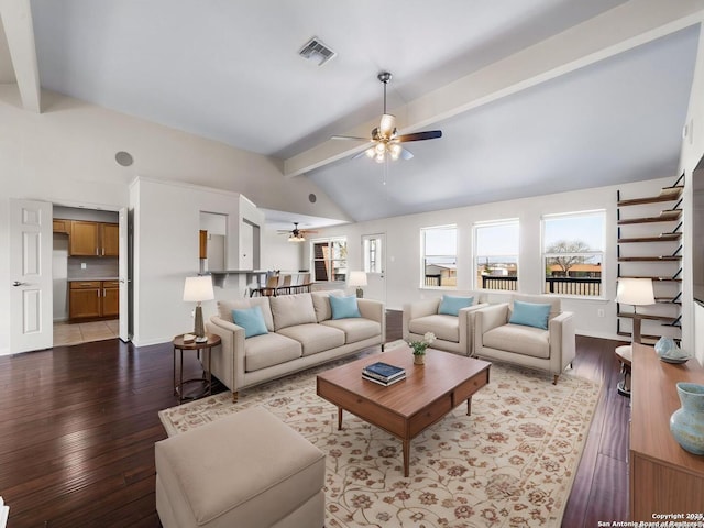 living room featuring beamed ceiling, ceiling fan, high vaulted ceiling, and light wood-type flooring