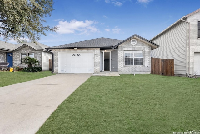 ranch-style house featuring a garage and a front yard