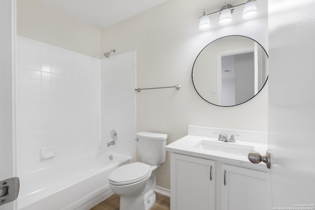 full bathroom with vanity, shower / bathing tub combination, hardwood / wood-style floors, and toilet