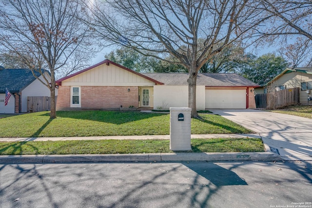 single story home with a garage and a front yard