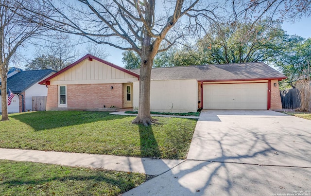 ranch-style home with a garage and a front yard