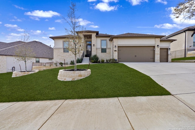 prairie-style home with a garage and a front yard