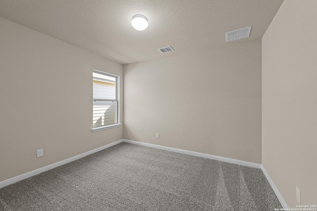 4237 Carlotta Dr, New Braunfels, TX 78130 - empty room featuring visible vents, carpet flooring, and baseboards