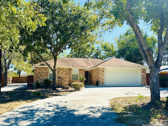 ranch-style house featuring a garage