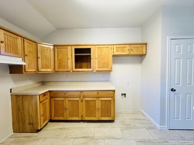 kitchen with vaulted ceiling