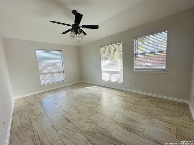 unfurnished room featuring ceiling fan