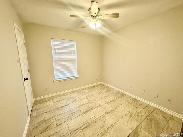 empty room featuring ceiling fan