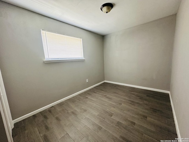 empty room with wood-type flooring