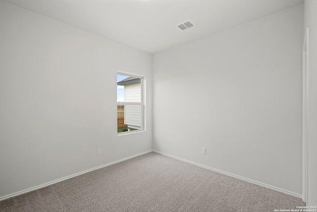 view of carpeted spare room