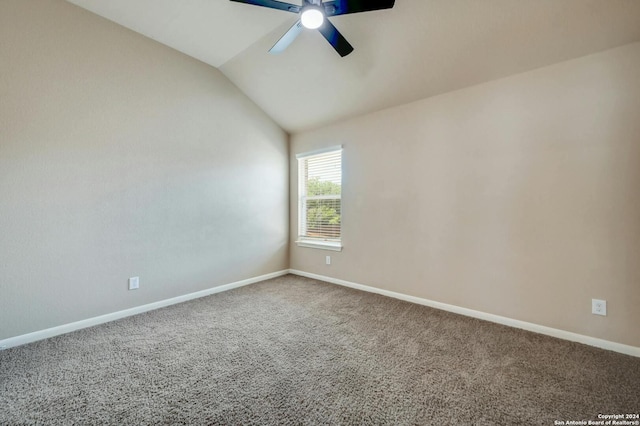 unfurnished room with lofted ceiling, carpet floors, and ceiling fan