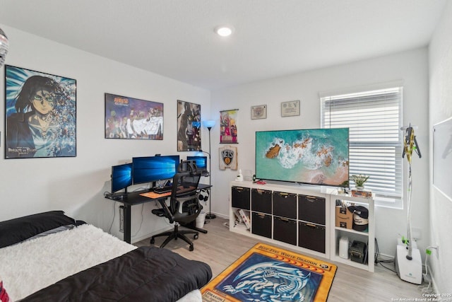 bedroom featuring light hardwood / wood-style flooring