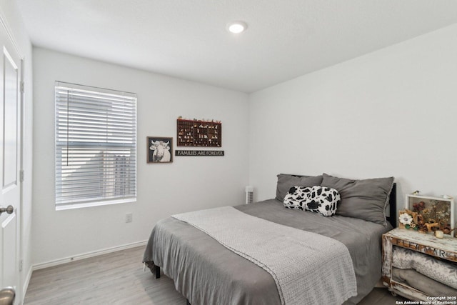 bedroom featuring light wood-type flooring