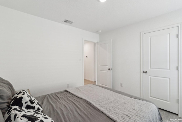 bedroom featuring light hardwood / wood-style floors