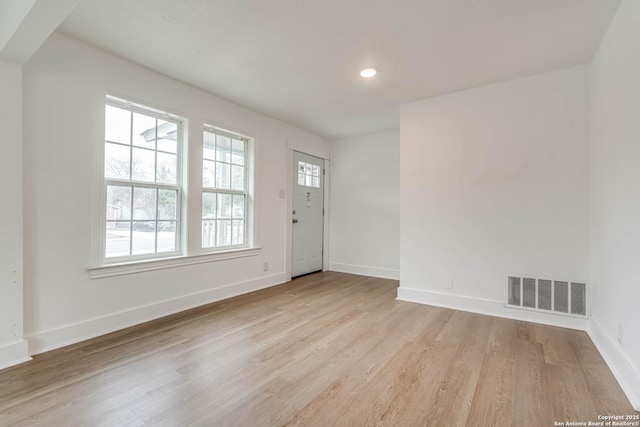 foyer with light hardwood / wood-style flooring