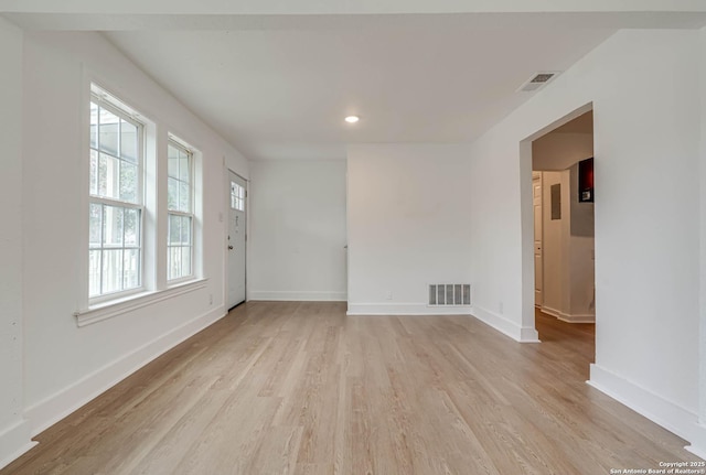 unfurnished room featuring light hardwood / wood-style floors