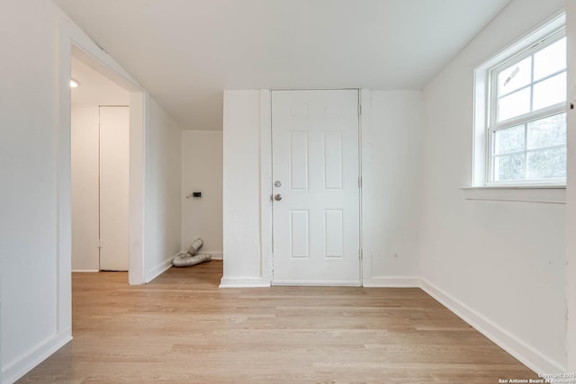 spare room with light hardwood / wood-style floors