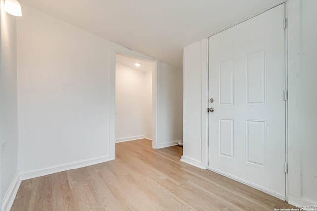 spare room with light hardwood / wood-style flooring