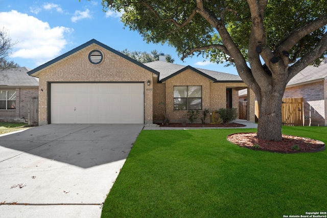 ranch-style house with a garage and a front lawn